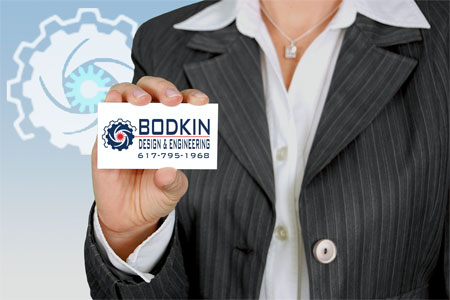 Business woman holding Bodkin Design business card